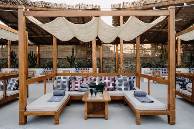 Pool Cabanas - A luxurious shaded poolside space, to enjoy daytime under the sun. (4-8 Guests).