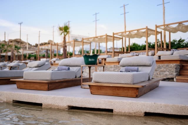 Waterfront Sunbeds - Area with unobstructed sea views & luxury beach service.